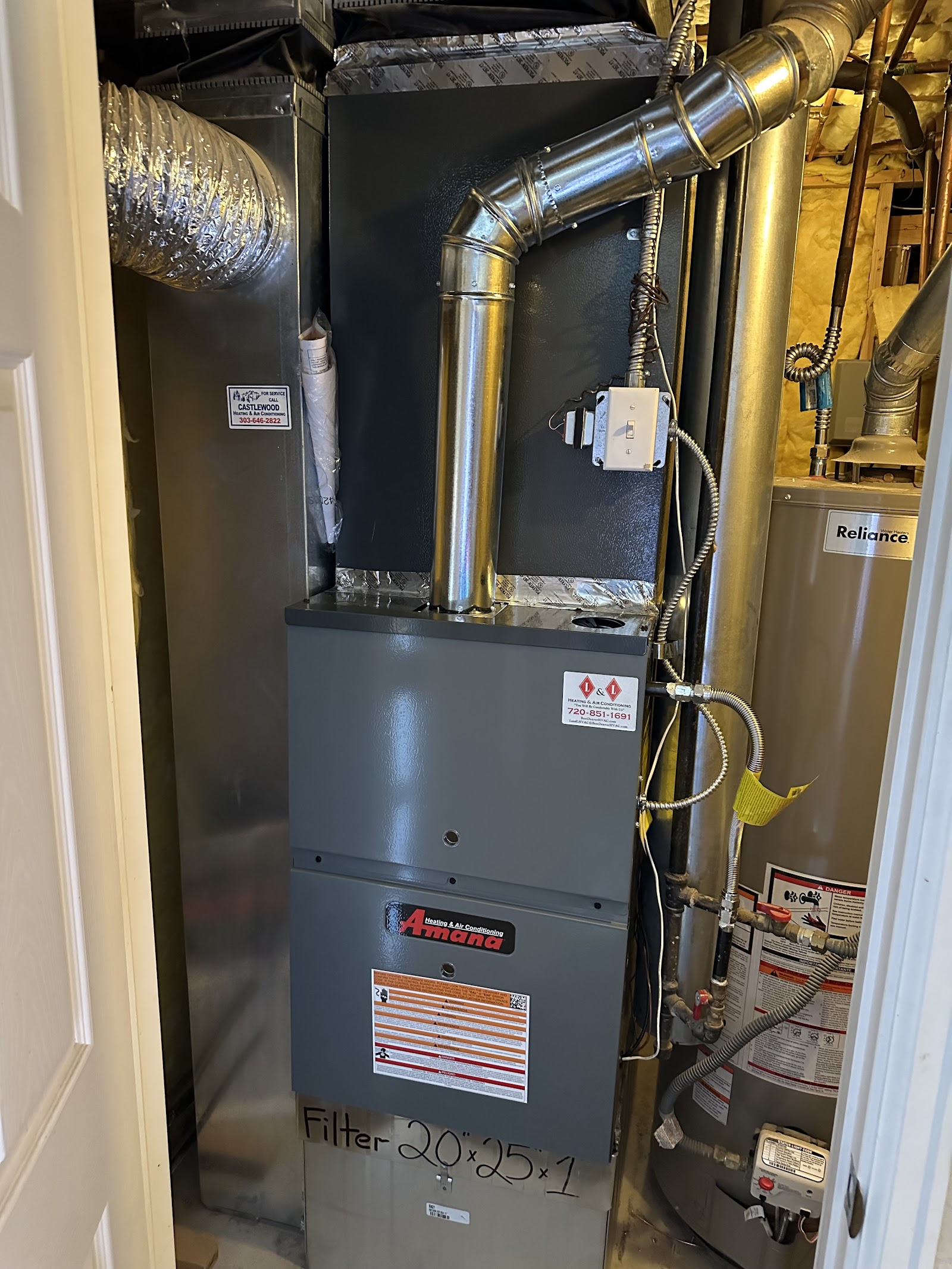 L & L Heating & Air Conditioning technician on site